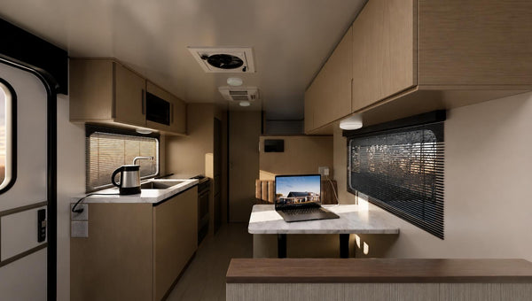 Interior moderno de autocaravana con zona de cocina